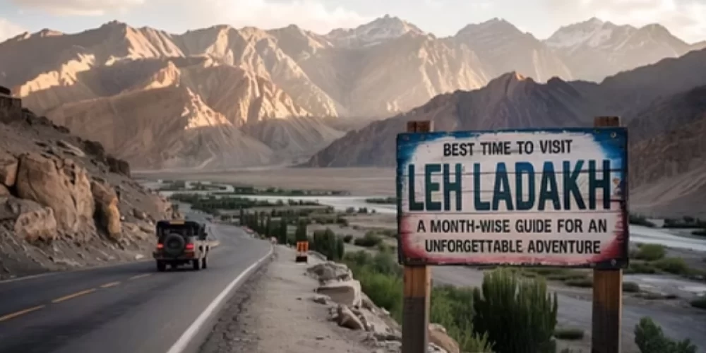 Road leading to Leh Ladakh with a signboard showing best time to visit Ladakh with mountain landscape.